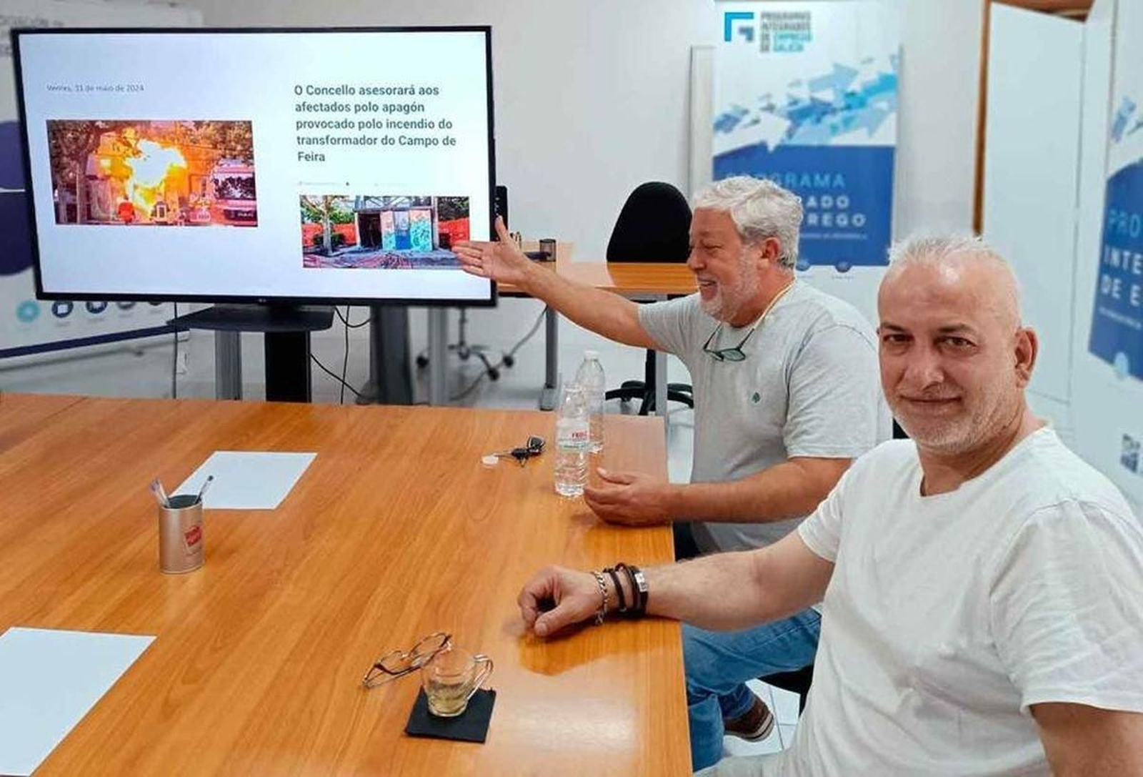 Imagen de dos de los empresarios durante el encuentro.