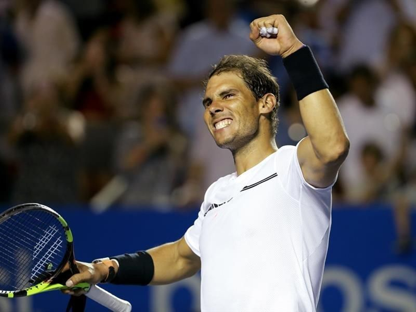 El español Rafael Nadal celebra al derrotar al croata Marin Cilic