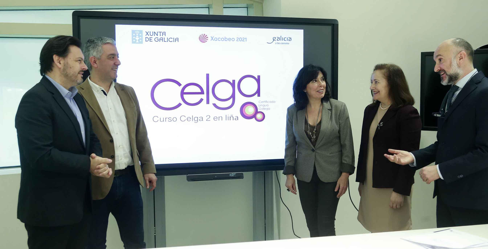 El secretario xeral de Política Lingüística, Valentín García, el secretario xeral da Emigración, Antonio Rodríguez Miranda, y la directora de Amtega, Mar Pereira