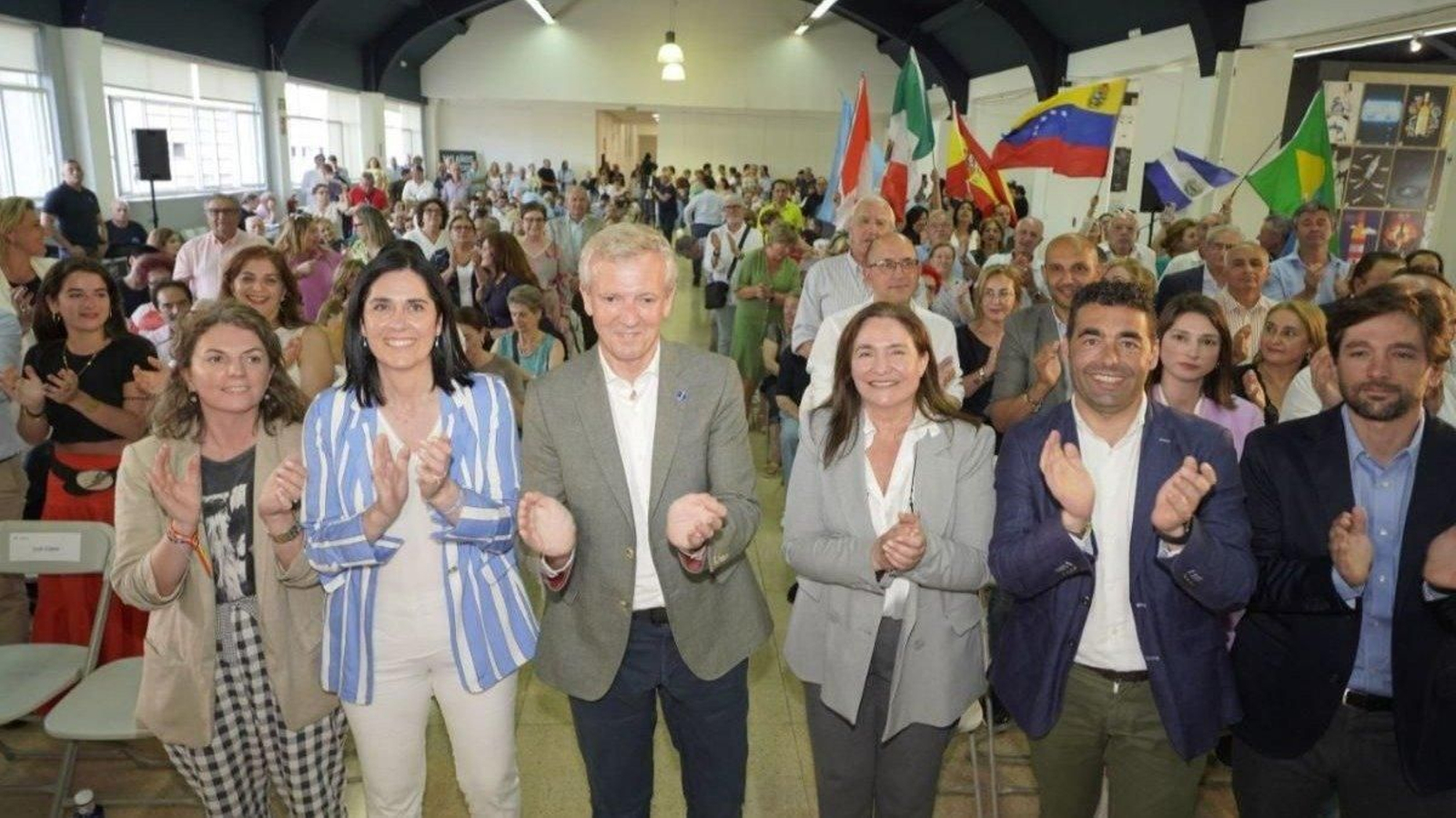 Alfonso Rueda, Luis López y Andrés Vázquez, ayer en el mitin del PP en la Estación Marítima.