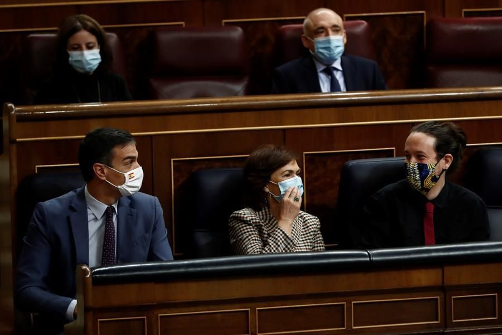 El presidente del Gobierno, Pedro Sánchez, la vicepresidenta Primera, Carmen Calvo, y el vicepresidente segundo, Pablo Iglesias