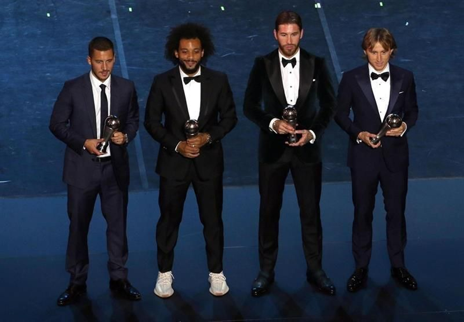 El español Sergio Ramos, el brasileño Marcelo Viera, el belga Eden Hazard y el croata Luka Modric, jugadores del Real Madrid