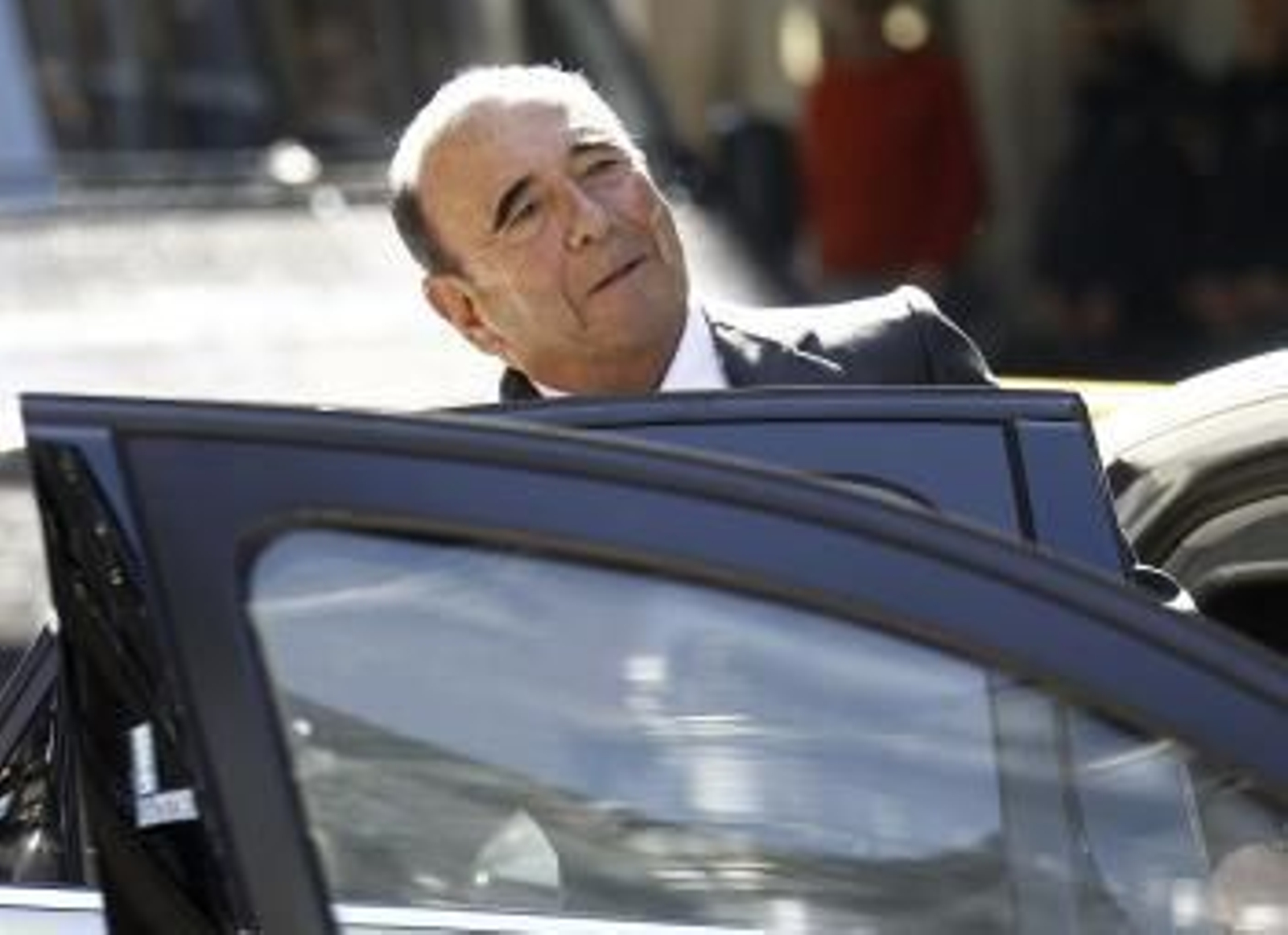 El presidente del Banco Santander, Emilio Botín, tras declarar en la Audiencia Nacional.