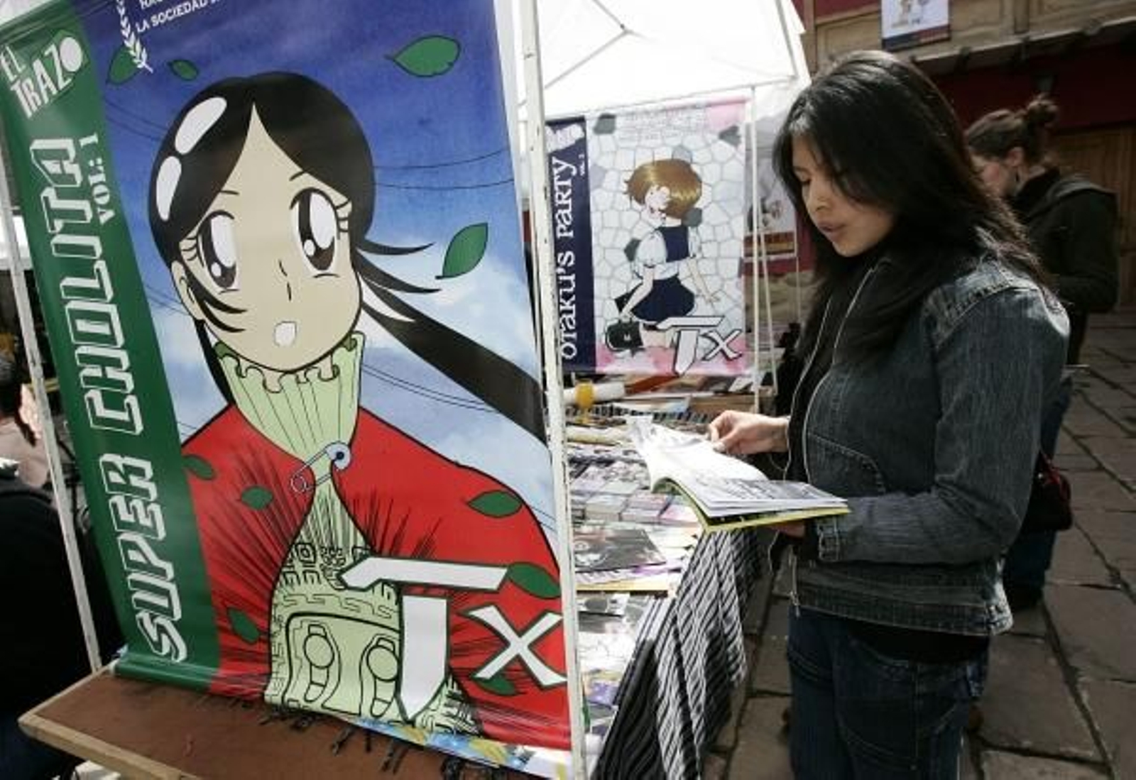 Stand con comics de la superheroína.