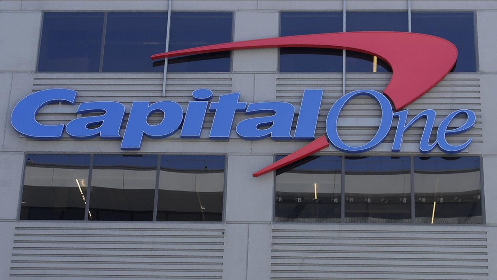 A Capital One sign is shown at a location in San Francisco, Tuesday, July 16, 2019. (AP Photo/Jeff Chiu)