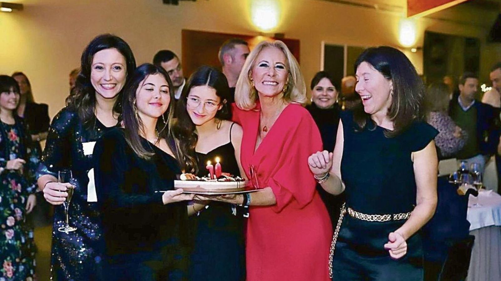 Corina Porro, de rojo.