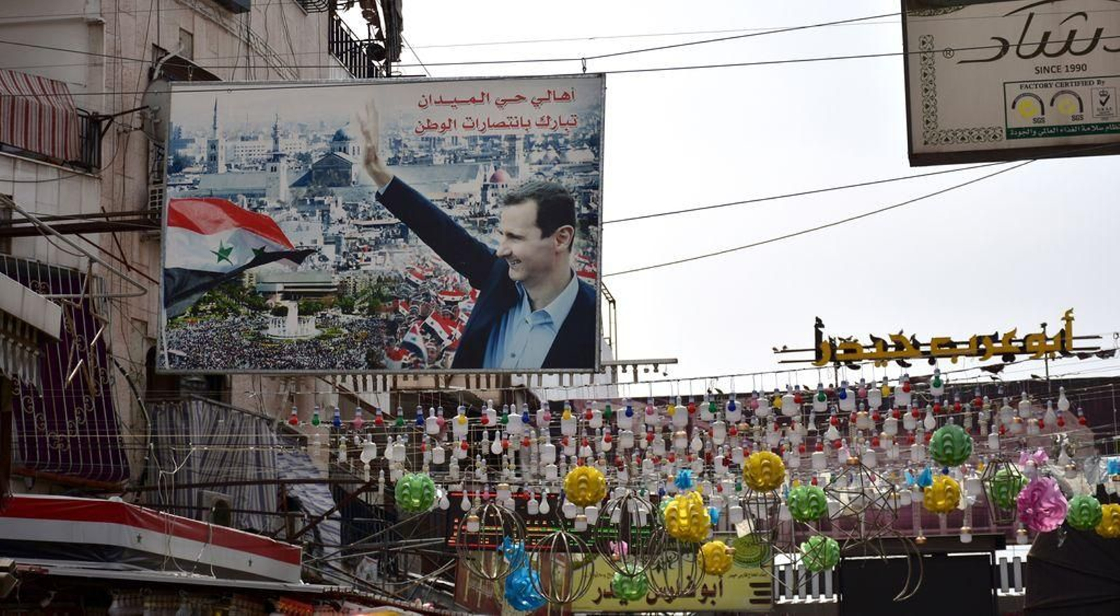 Retrato del líder del régimen sirio, Bachar al Asad, en una calle de Damasco.