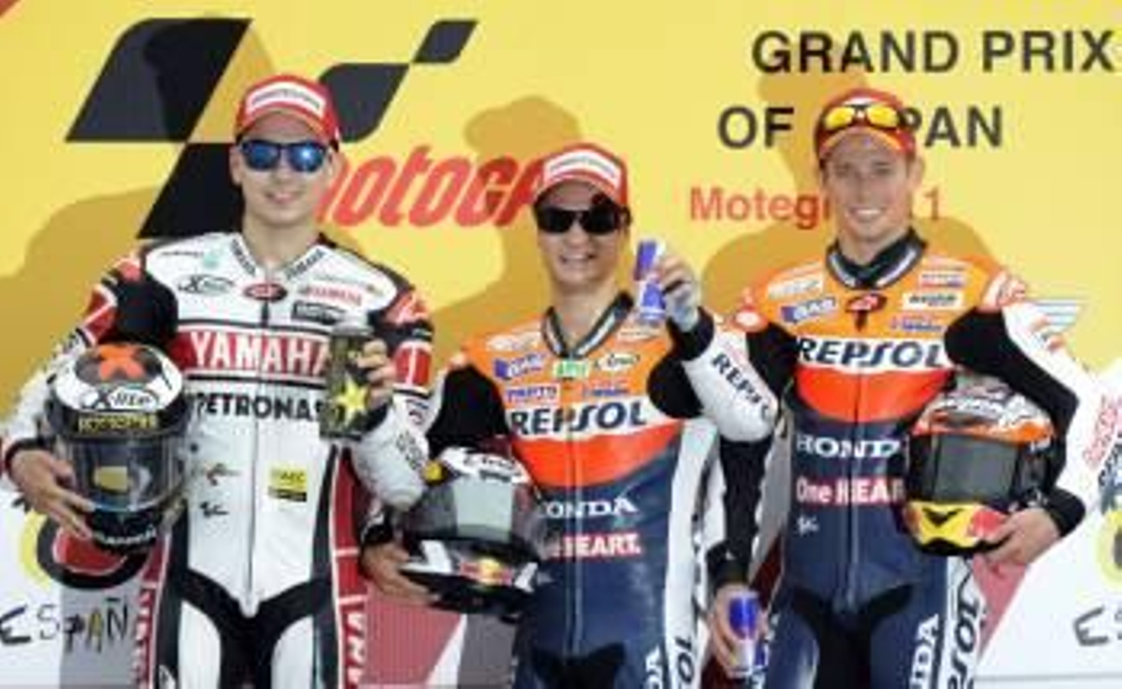 Lorenzo, Pedrosa y Stoner, el podio del GP de Japón de MotoGP en el circuito de Motegi. (Foto: F. ROBICHON)