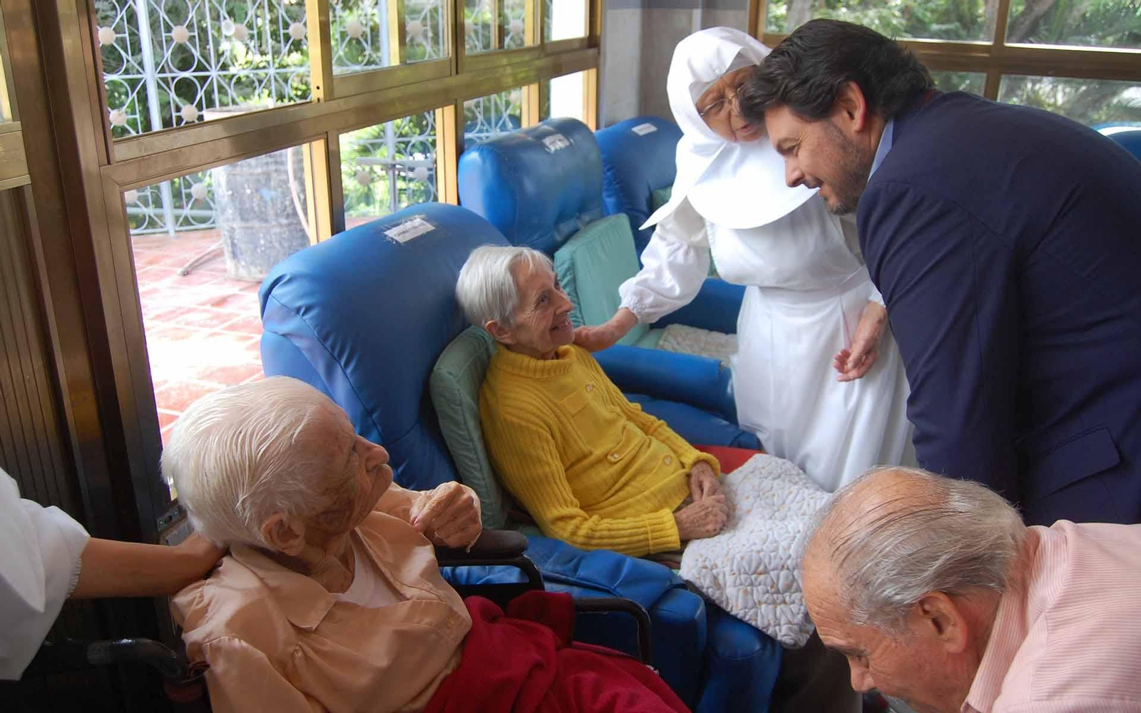 Foto de archivo de la visita del secretario xeral da Emigración al Hogar San José de Caracas