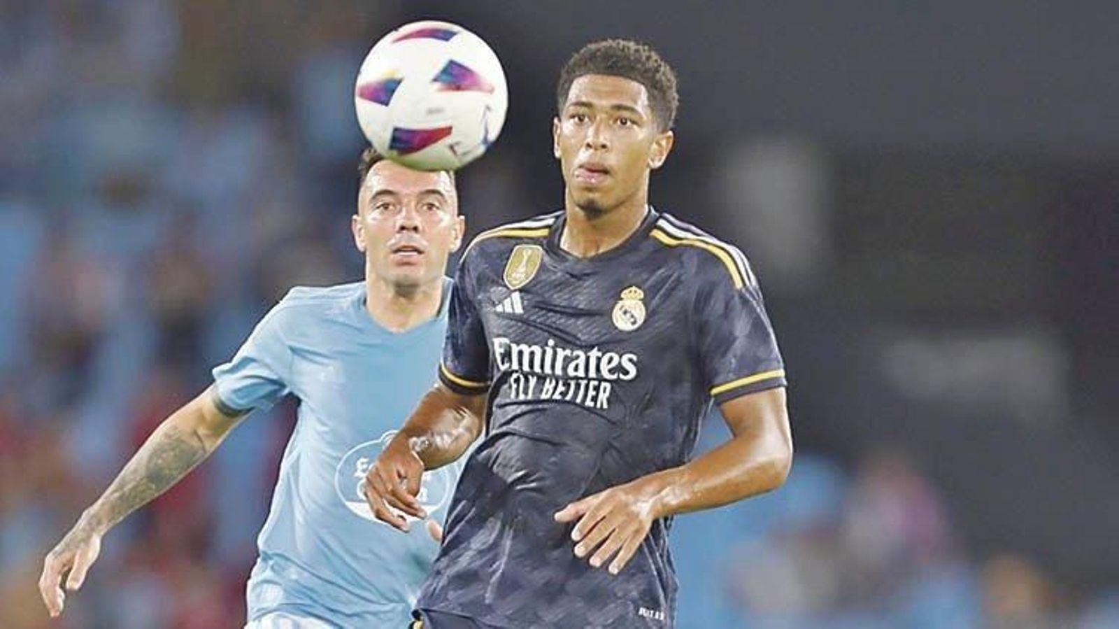 Iago Aspas y Jude Bellingham, en el duelo de la primera vuelta. El británico no puede jugar mañana.