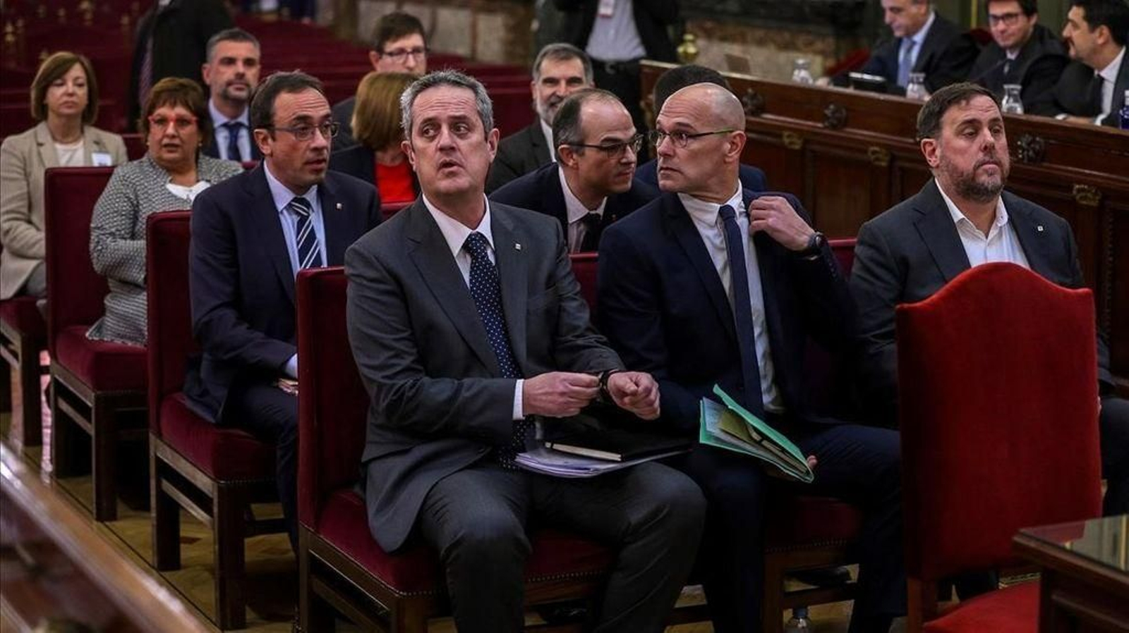 Joaquim Forn, Raül Romeva y Oriol Junqueras, durante la primera jornada del juicio del "procés".