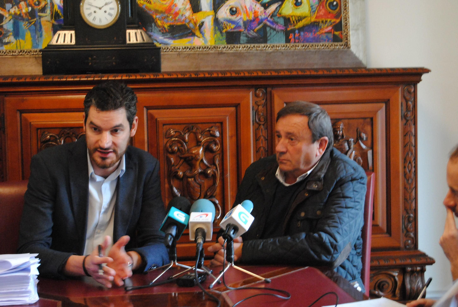 El abogado, Juan Blanco, con el presidente, Juan Domínguez.