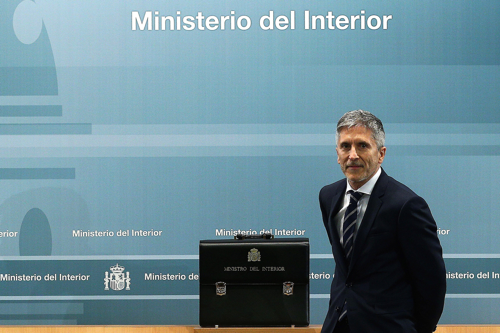 Grande-Marlaska, junto a la cartera ministerial.