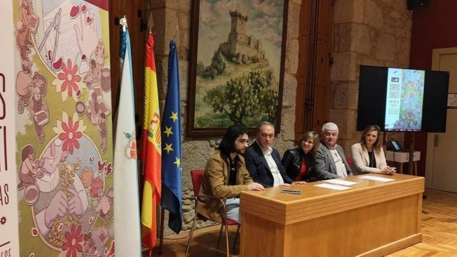 El cartel en primer plano, junto a Sergio de Arcos, Reguera, Nava Castro y González  Carrera.