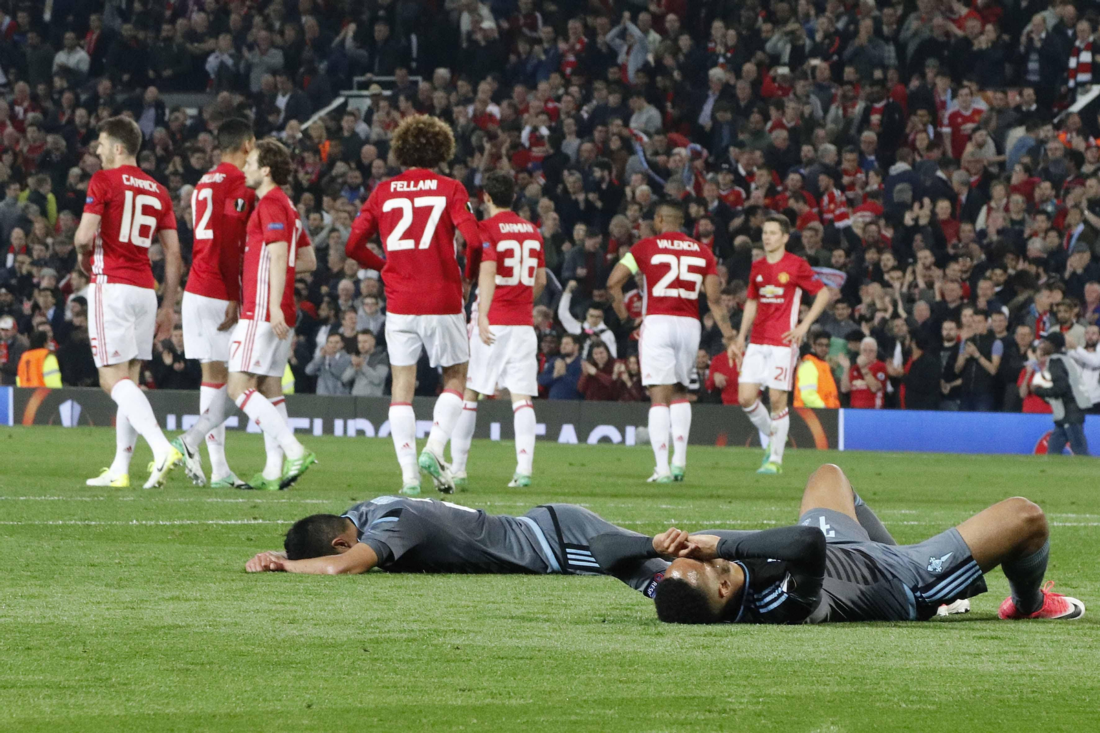 Las mejores imágenes del partido de vuelta entre Manchester United y Celta (1-1). // J.V. Landín