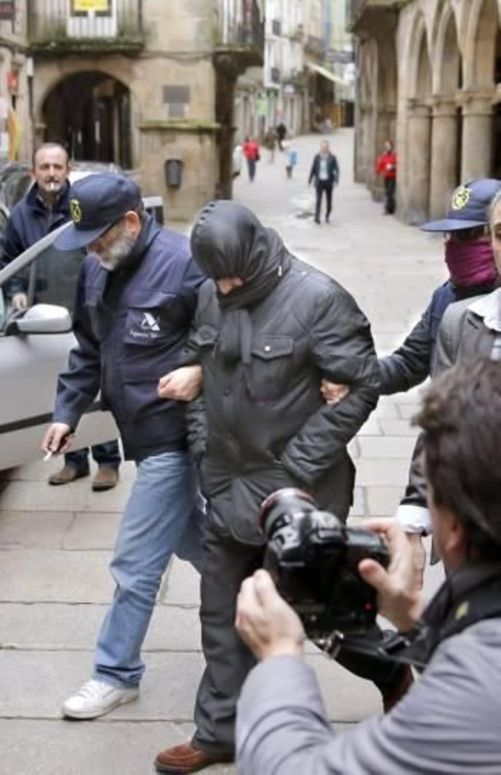 José Luis Míguez Rey, gerente de Aquagest en Santiago, tras su detención. (Foto: LAVANDEIRA JR)