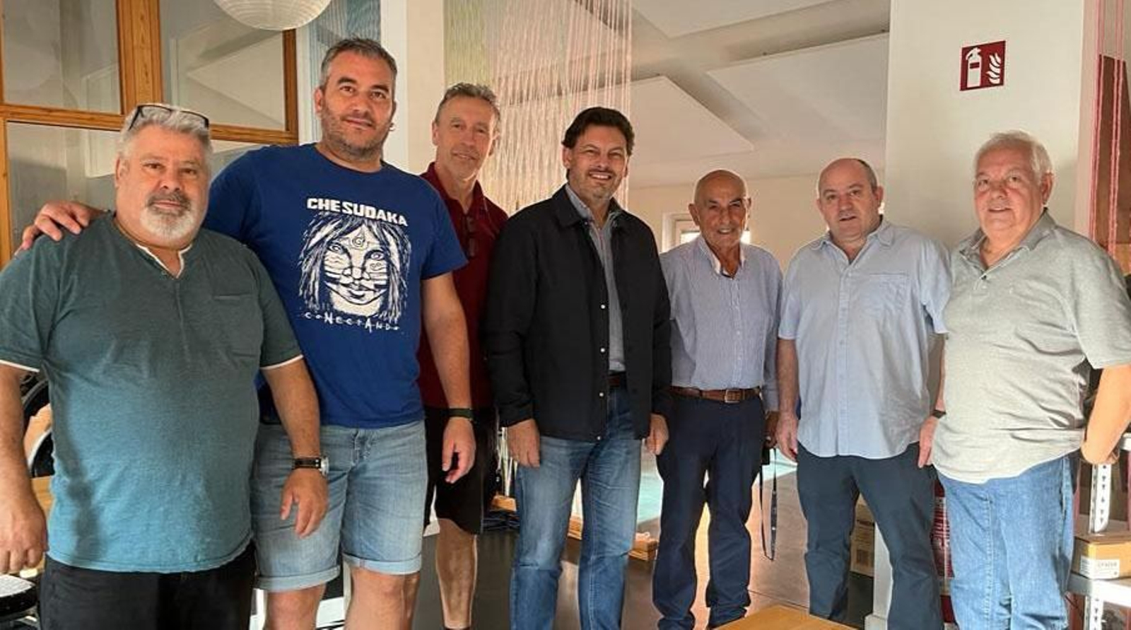 Imagen de la visita del secretario xeral da Emigración a la ACG de Hamburgo