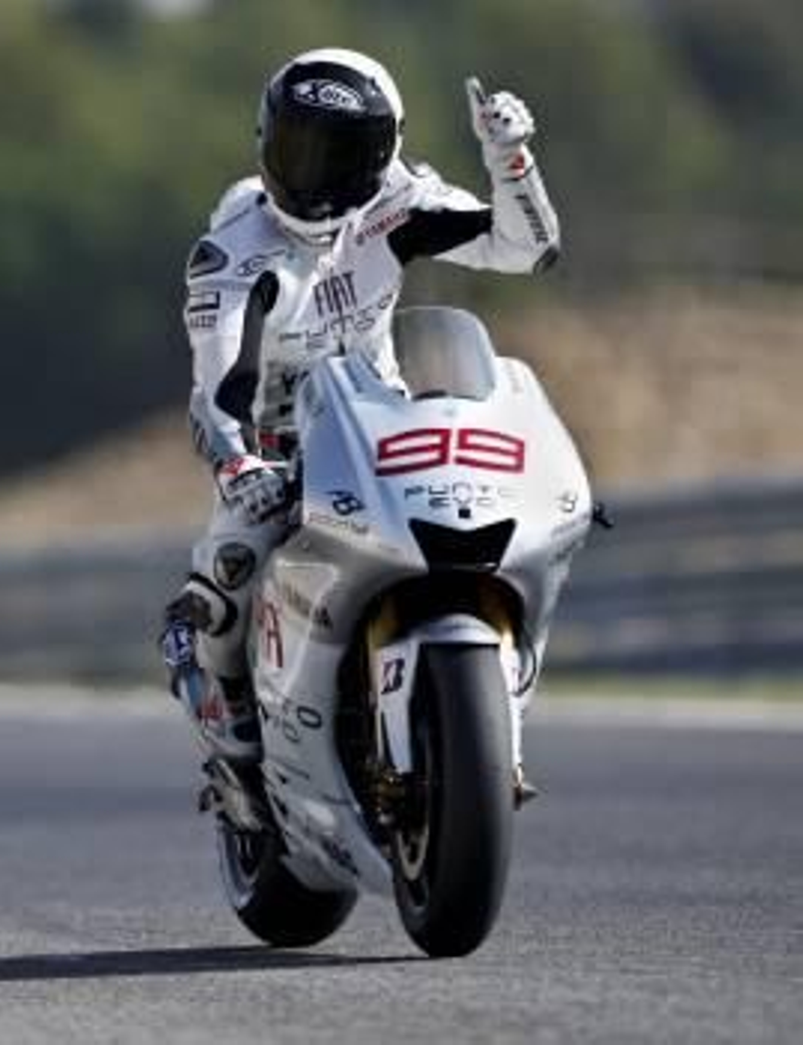 El español Jorge Lorenzo celebra la pole. (Foto: Mario Cruz)