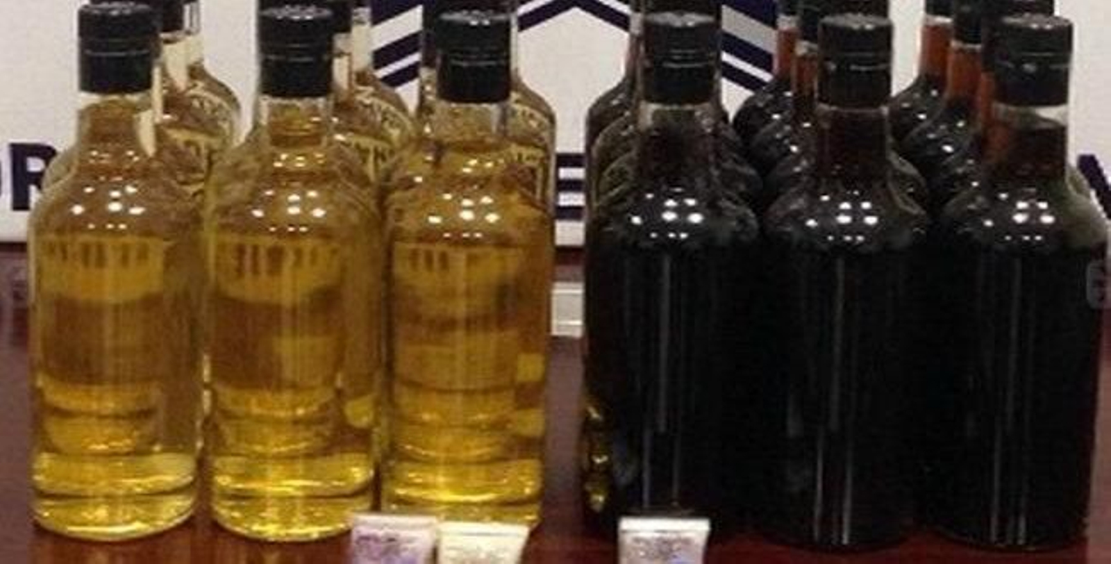 Botellas de droga sintética, líquida.